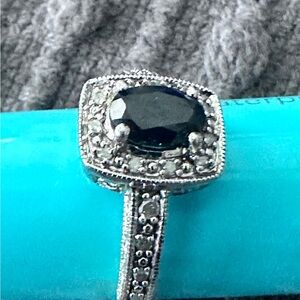 Intricate Silver Ring with Black Stone